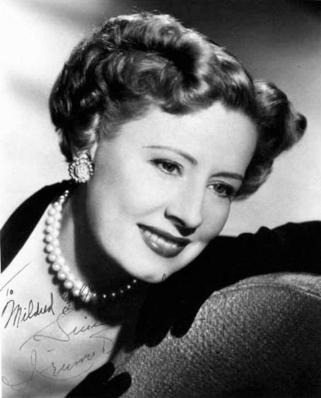 1953, February 22 - "Versatility Keeps Irene Dunne Beautiful, Popular, Ageless"
