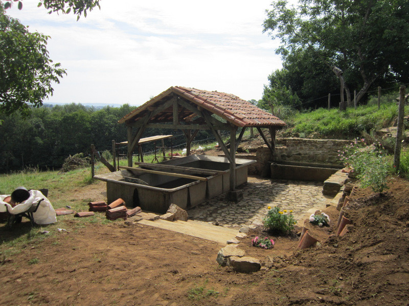 2014: Le lavoir rénové! 5 ans de chantier et des litres d'huile de coude de plus de 100 jeunes