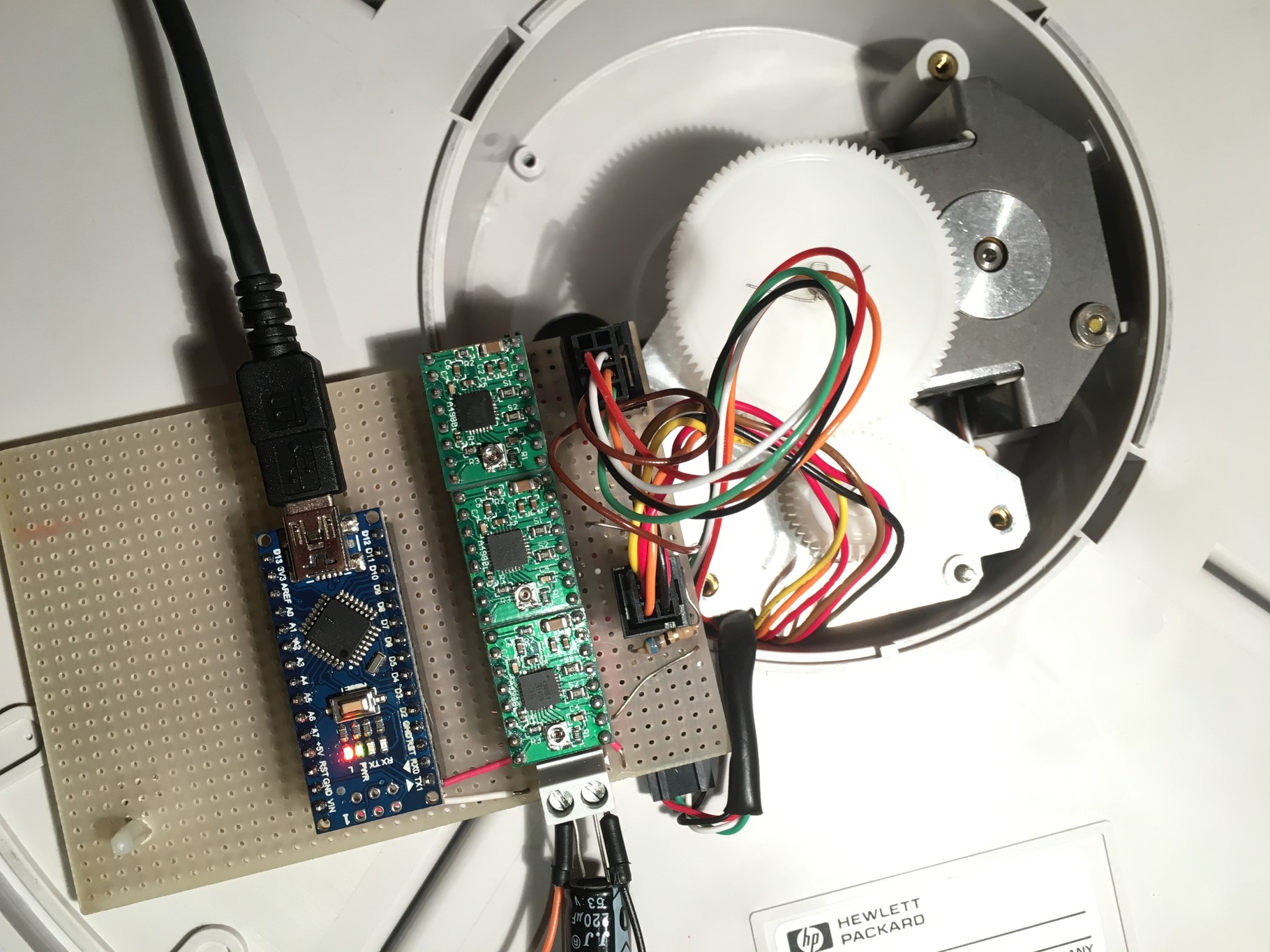 The base and controller board connected to steppers and homing sensors