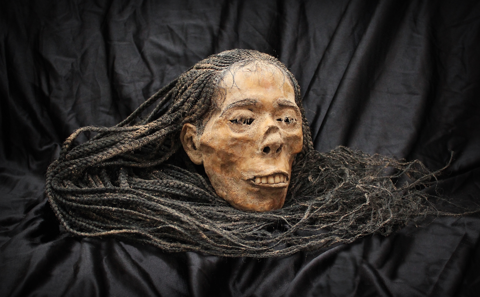Inca mummy head with braids