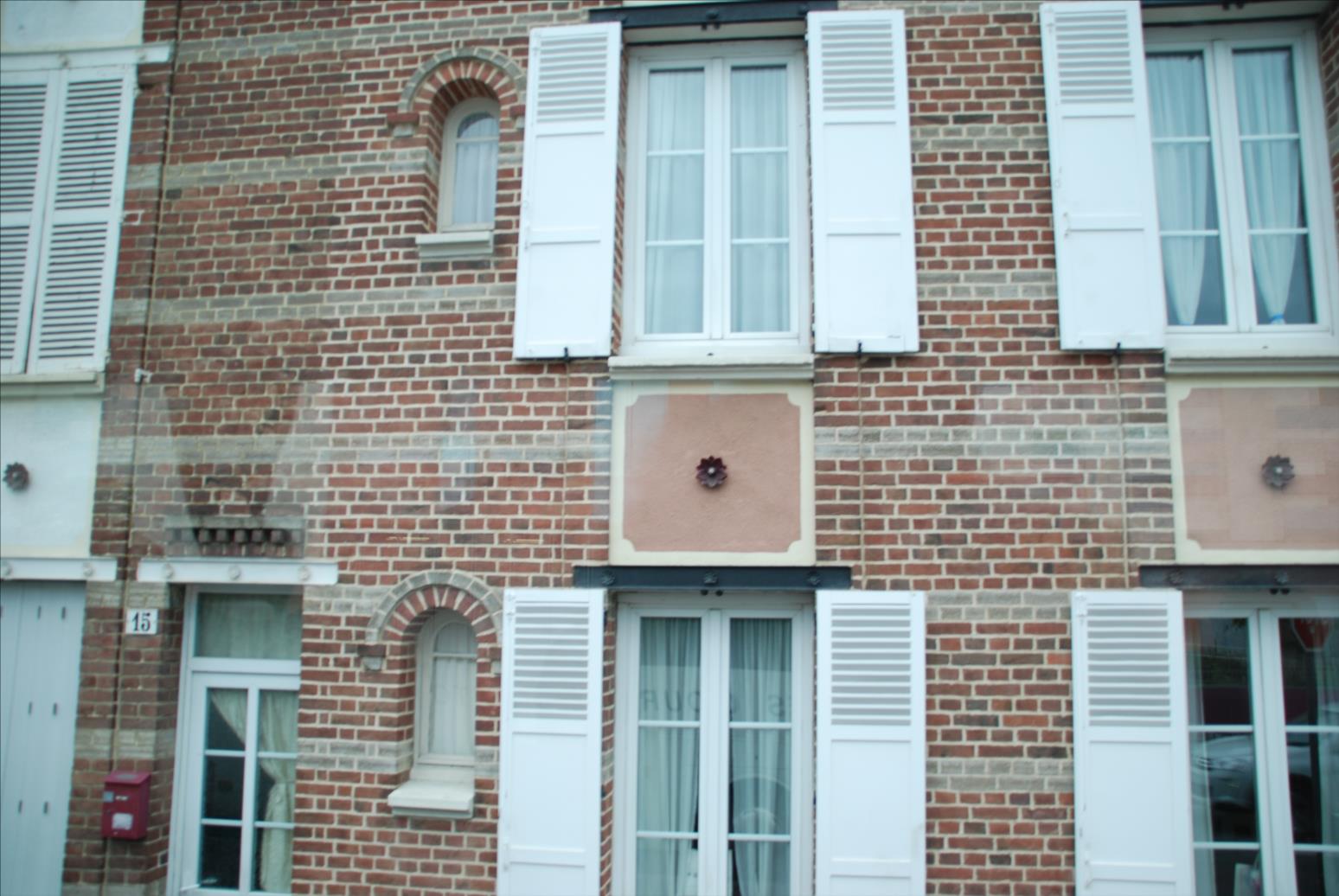 Utilisation des fleurons sur une façade