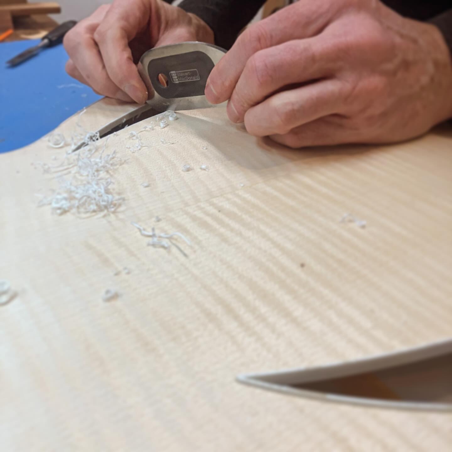 Scraping the soundhole bindings