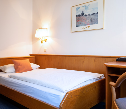 Komfort-Einzelzimmer Bett