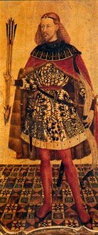 Imatge de Sant Sebastià amb les sagetes de l'amor a la mà. Diu la tradició que el personatge que va fer de model per a aquest retaule de la col·legiata de Xàtiva fou el mateix Ausiàs March.