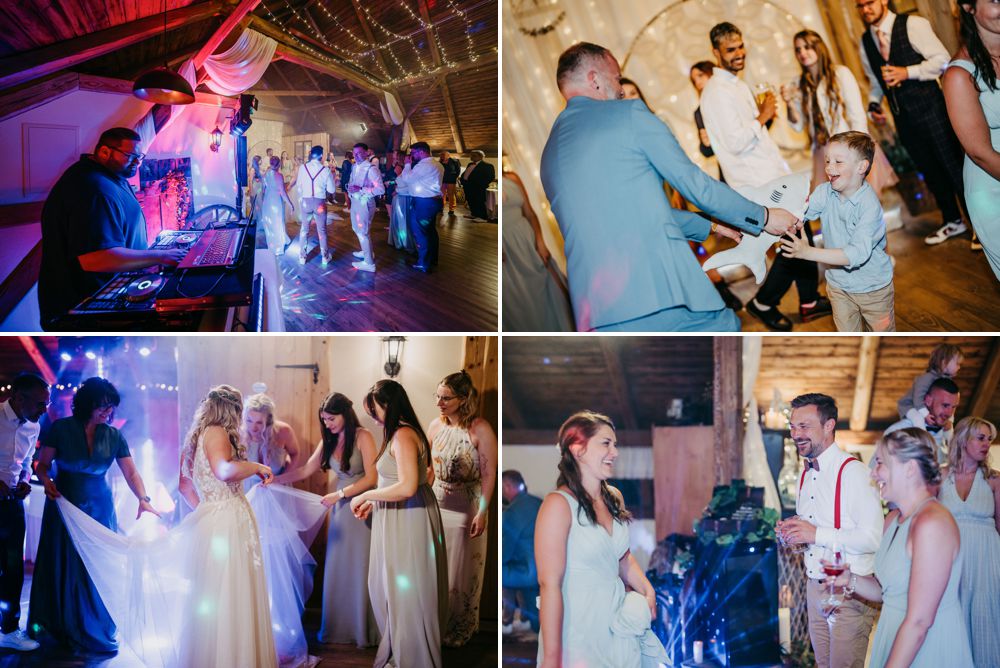 Party-Stimmung pur: Gäste tanzen ausgelassen in der Tenne, eingefangen vom [Hochzeitsfotograf Erzgebirge](https://www.lichtecht-hochzeitsfotografie.de).