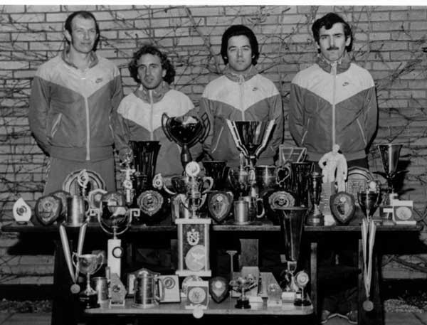 Gloucester AC team of the 1980s display their ultra distance running trophies. L to R Martin Daykin, Dave Dowdle, Ken Leyshon, Chris O'Carroll