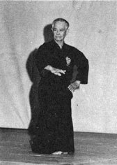 Uehara sensei demonstrating mai no te at a presentation