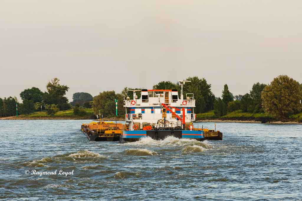 pusher boat with lighters on the river rhine