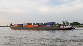 container barge on the river rhine