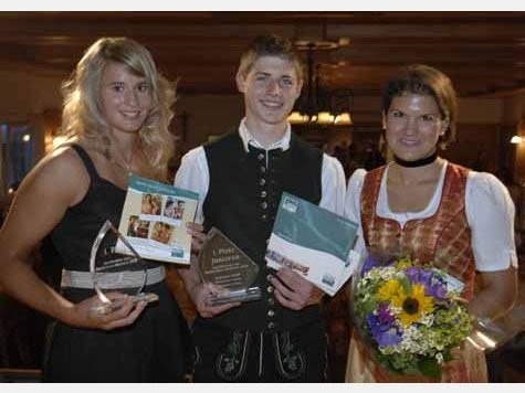 Die Sieger Natalie Geisenberger und Seppi Estner mit Sabine Wittmann