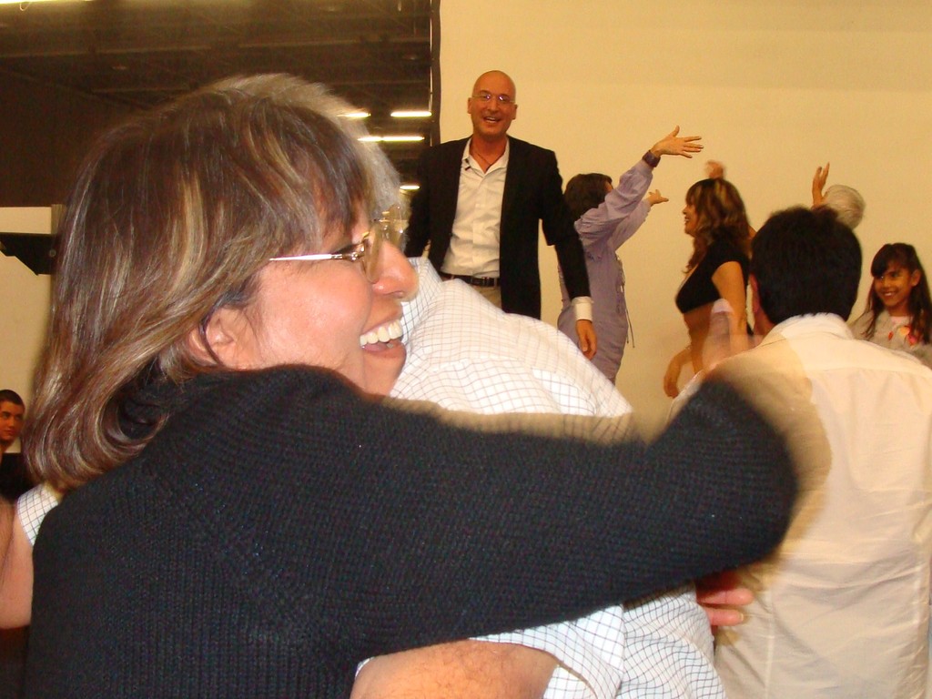 Hugging during an Emotional Managemente Seminar.