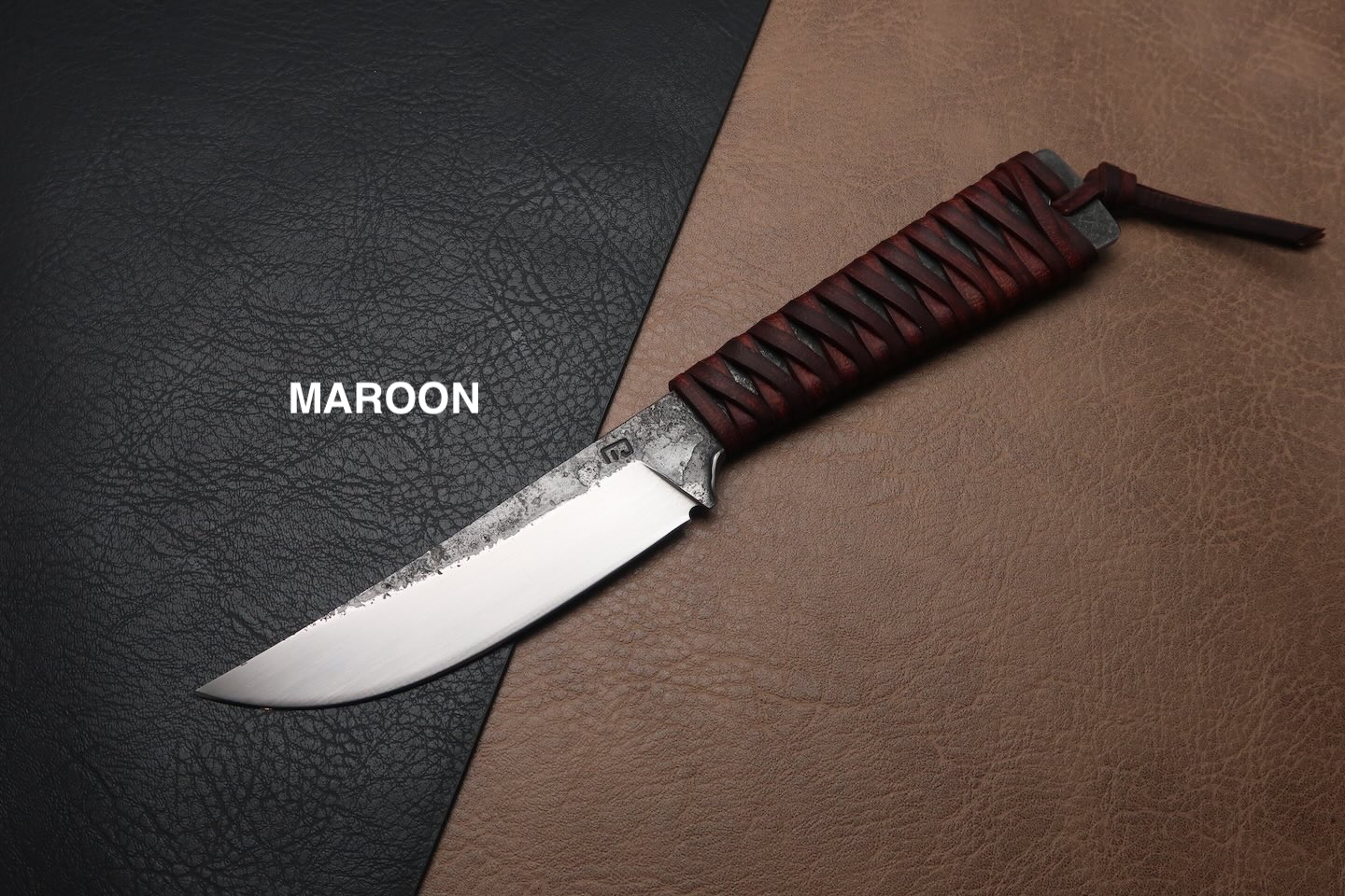 couteau forgé avec manche en cuir tressé