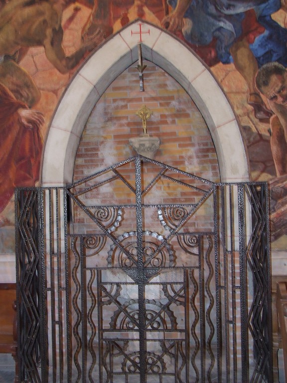 La grille des fonts baptismaux