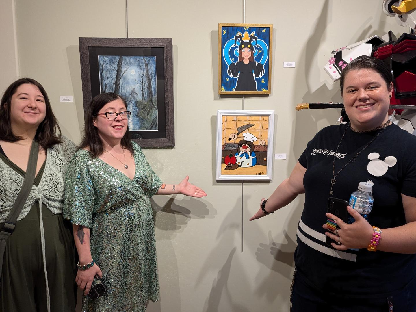Ashley Herman & Laikyn Navarre presenting their "roommate" project portraits - inspired by video games "Kingdom Hearts" & "Overcooked"