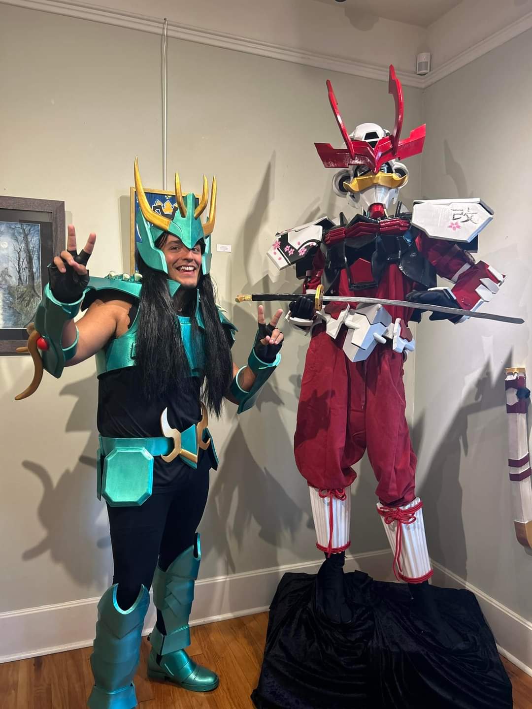 Kirk Cano poses in costume with his handmade Gundam-inspired cosplays