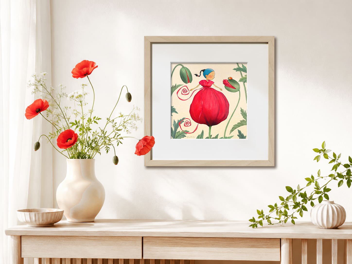 Illustration encadrée au mur de "La bête à Bon Dieu" de Timeliot. Il est dans le coquelicot qui lui fait une robe. Une coccinelle le regade