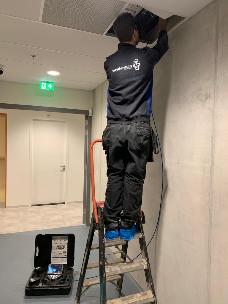 Ventilatiekanalen inspecteren voor oplevering schoolgebouw