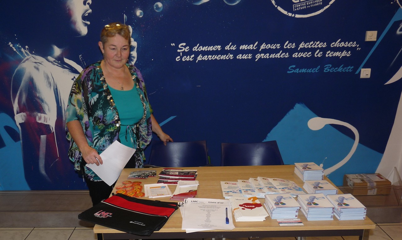 Francine FEIX et son stand LMC France - Strasbourg