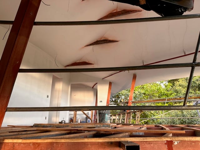 December 2023 - the ceiling of the first room has been primed and the railing has been welded on