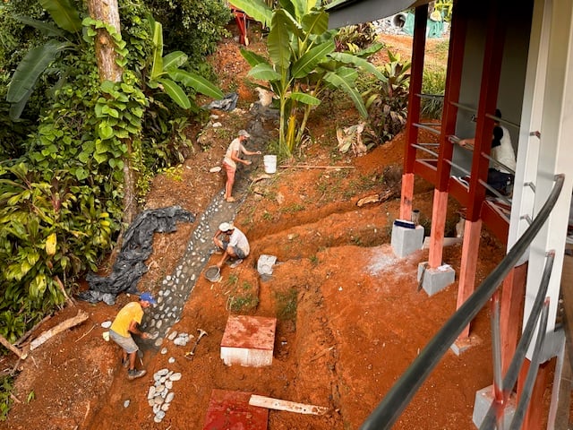 January 2024 - drainage ditch along the border is lined with stones