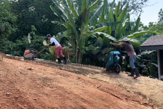 February 2024 - our neighbors José and Juan Luis are laying the base course of the access path to the house 