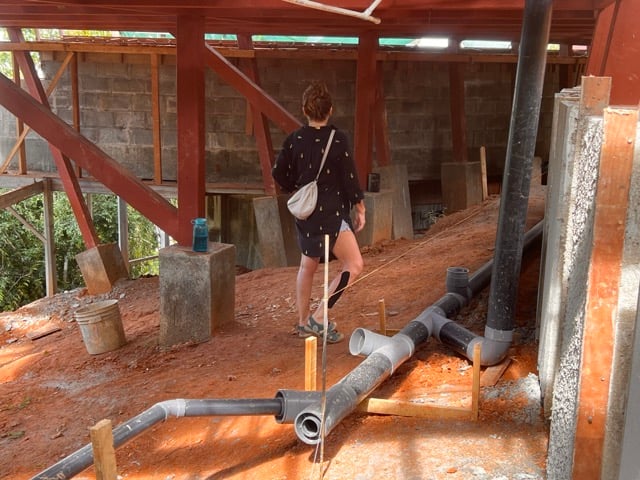 August 2023 - finally the sanitary pipes can be laid - in the background the pool floats on the technical room