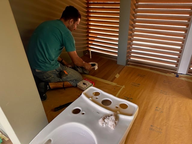 January 2024 - the house is slowly becoming habitable: the first toilet is installed by our electrician/plumber Wally