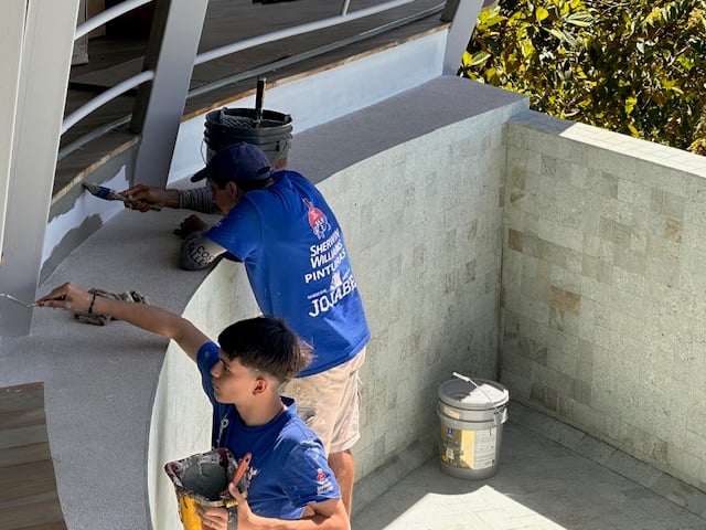 February 2024 - painters at work around the pool