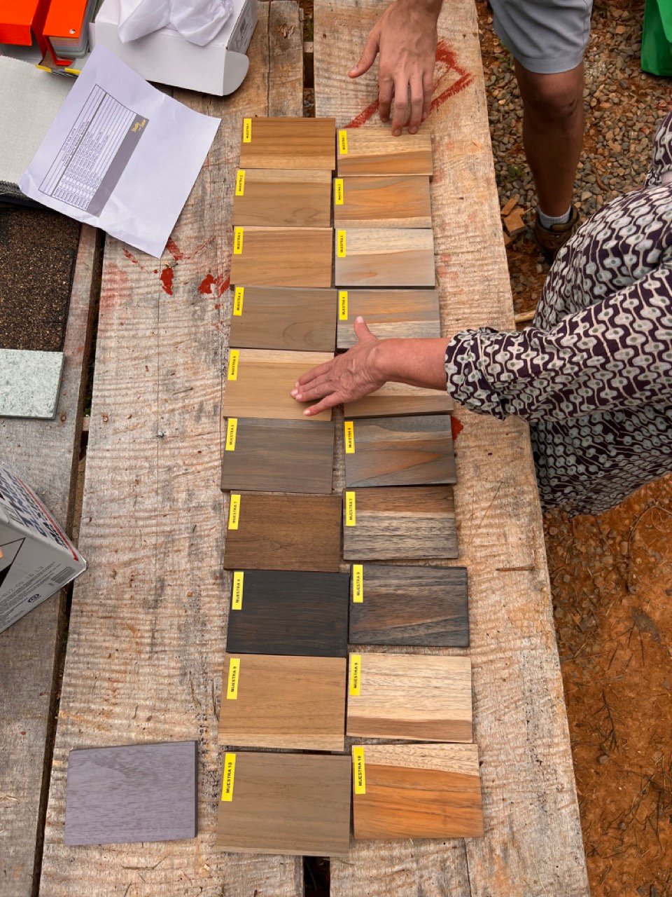 April 2023 - Architect Fred and Sandra are discussing color samples for the teak wood