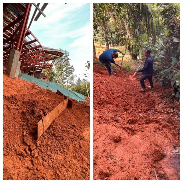 August 2023 - the earth from the foundation trench is laboriously shoveled back up the slope