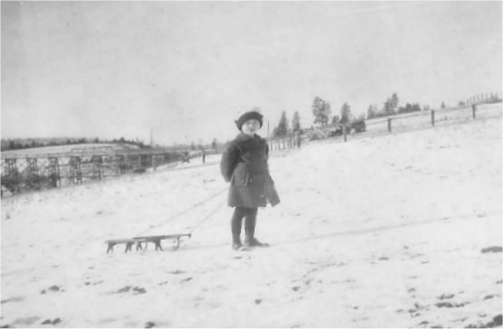 1918: Winter view of the bridge on Forker Road by the intersection with Moffat and Judkins (bridge built in 1905 and taken down in 1922). Sister Vivian Johnson