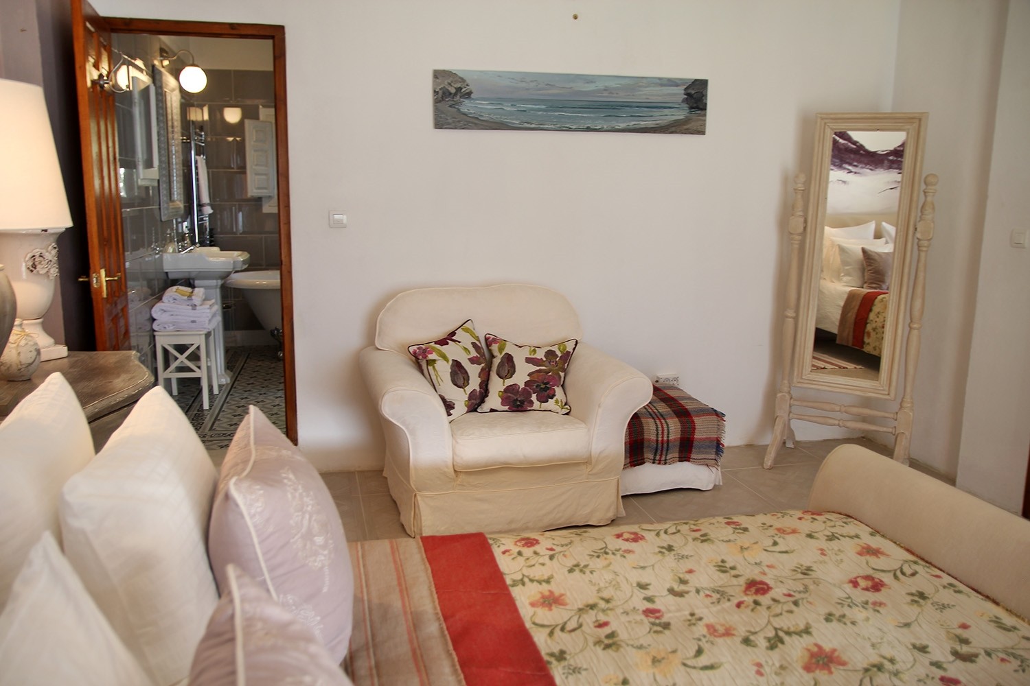 The bedroom with a view to the bathroom