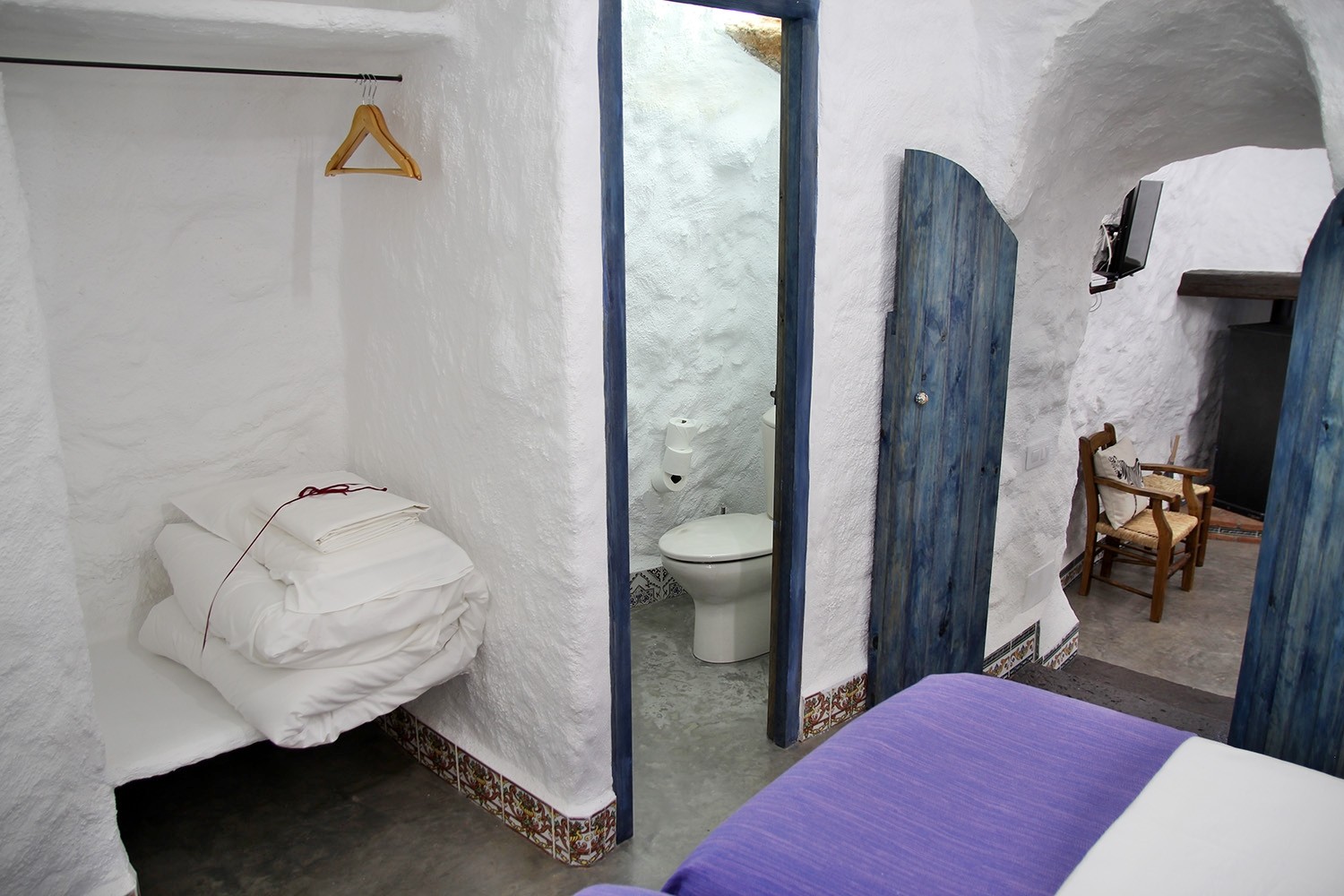 The toilet in the bedroom