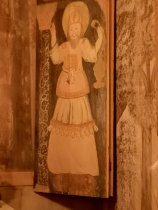 Jesus som den evige och fullkomlige prästen Melkesedek (eller kanske en bild av det Aronitiska prästerkapet, men jag tror mer på det första) 