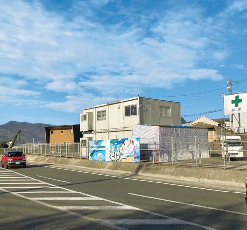 バイパス沿いの社員さん似顔絵看板