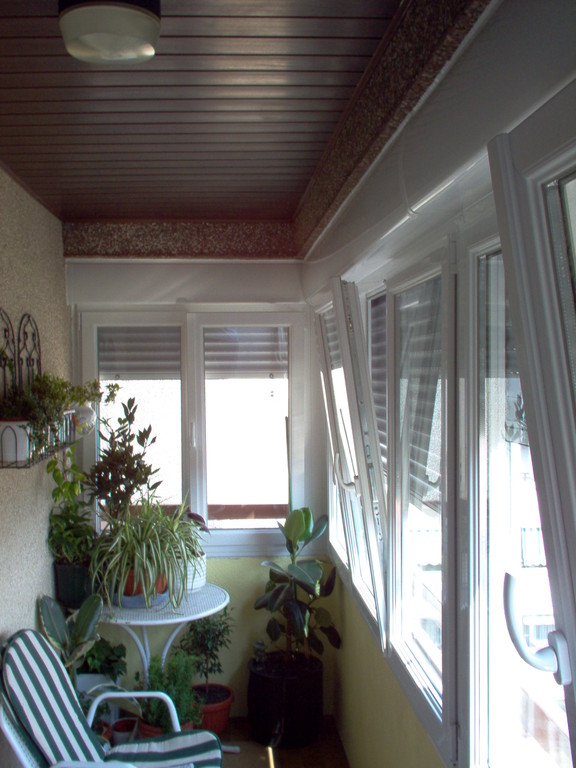 Cerramiento de terraza de pvc con perisanas monoblock