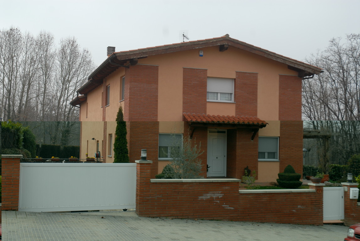 Puerta corredera modelo  ARAVIS de barrotes en color verde