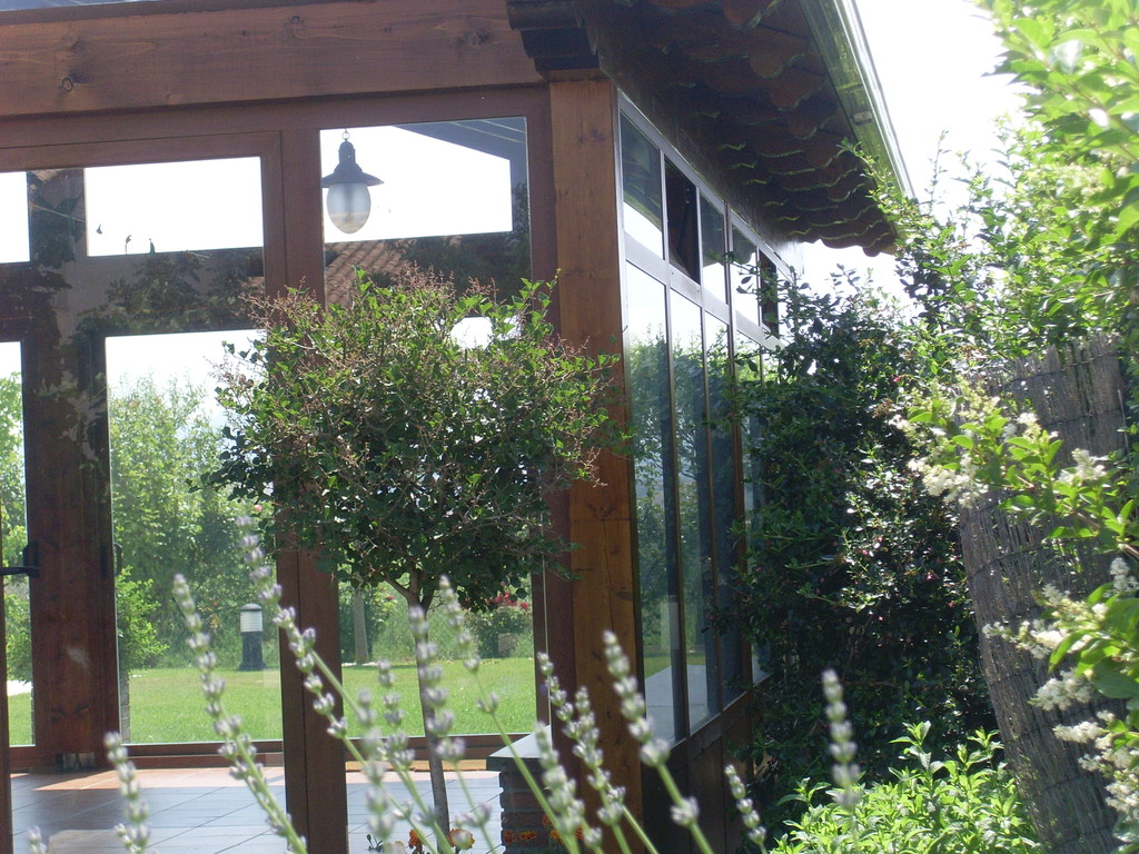 Porche de aluminio y madera