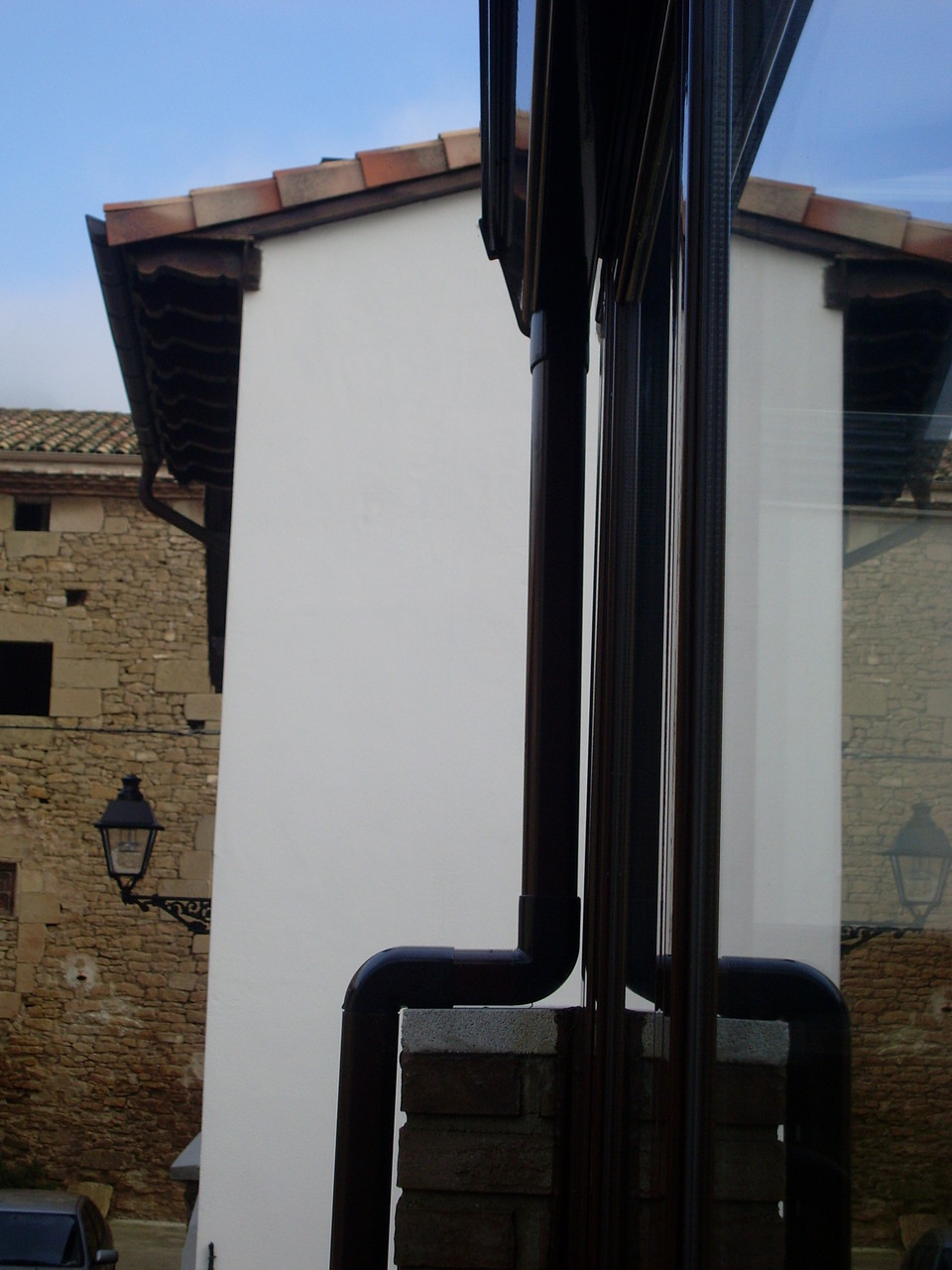 Porche de aluminio y policarbonato