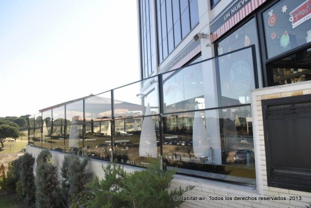 Cortavientos regulables de vidrio