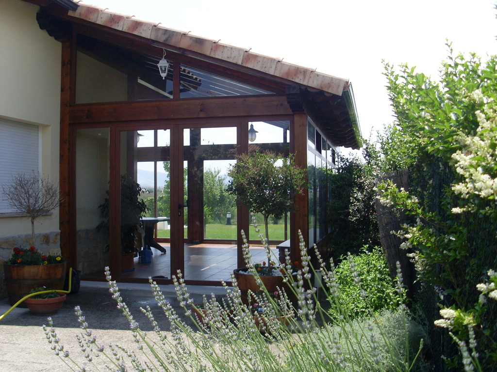 Porche con cierres de corredera