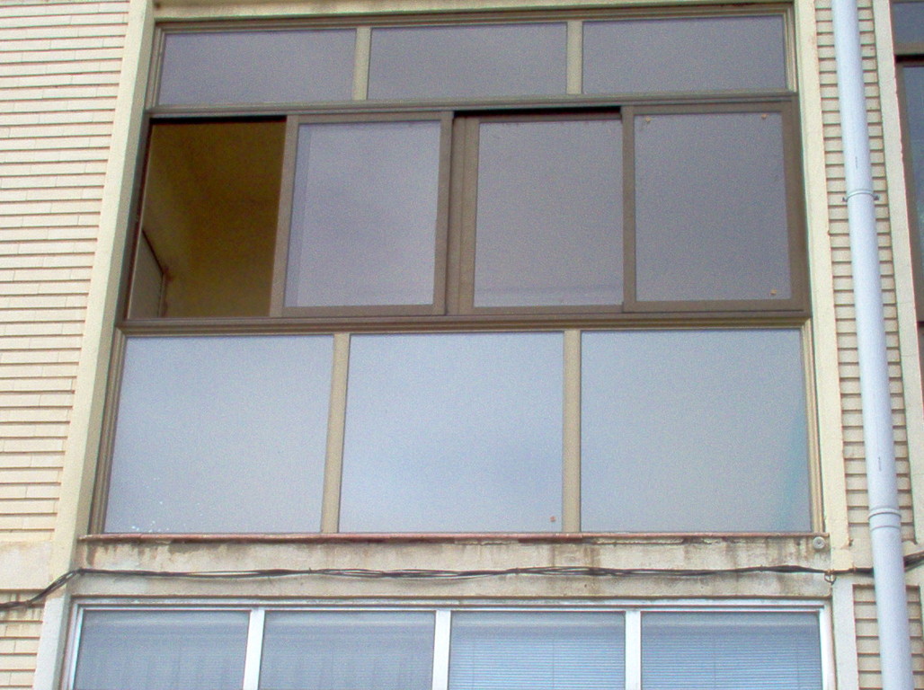 Cerramiento anodizado bronce