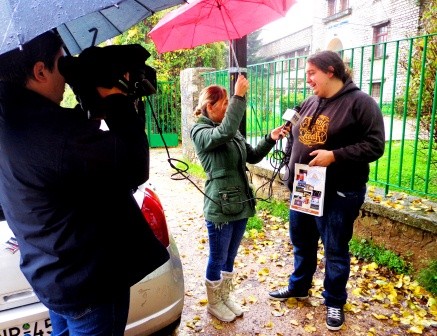 Participant of the project giving an interview about the project to a local news channel