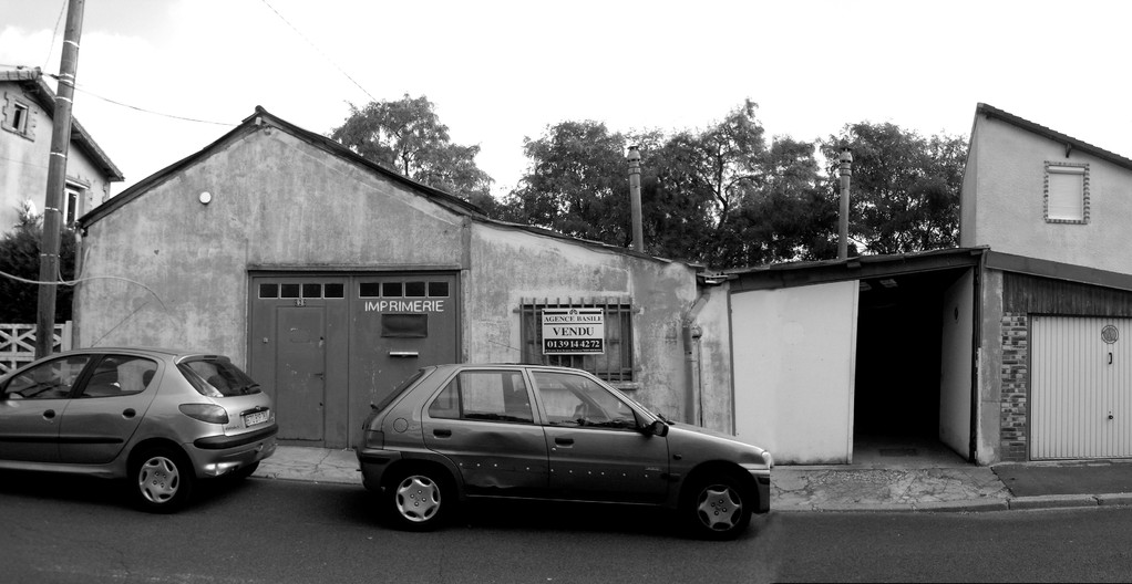 façade sur rue, l'état d'origine: un hangar et deux volumes bas