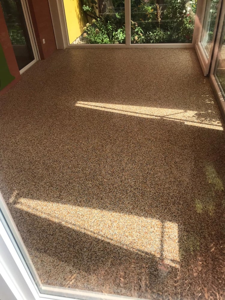 Steinteppich, der ideale Fußbodenbelag für Wintergarten