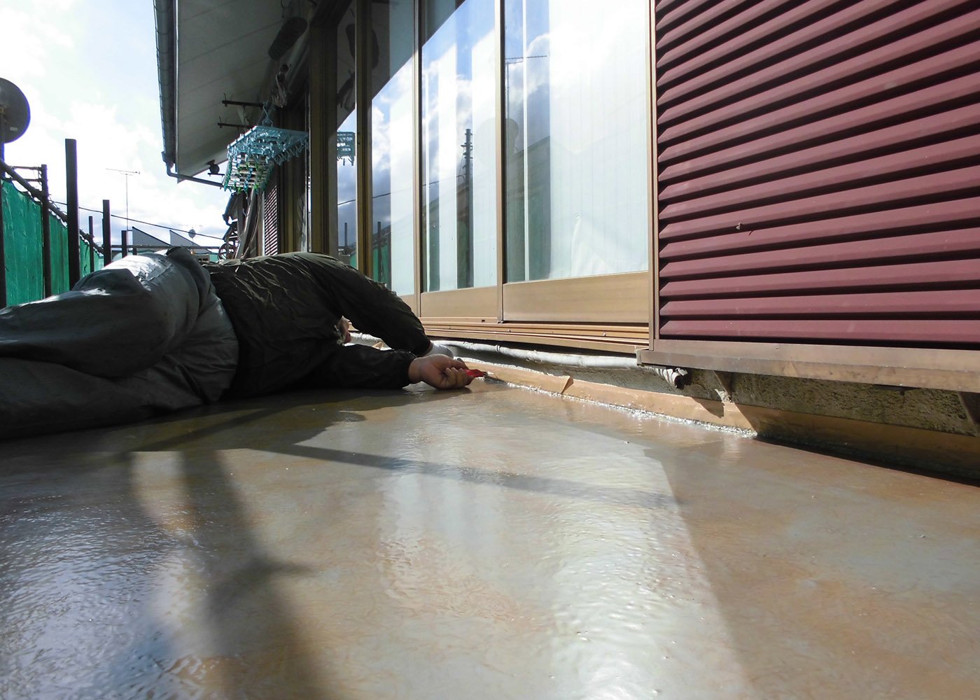 戸建ベランダ防水工事　雨の侵入しやすい立上り部分もしっかり防水します。