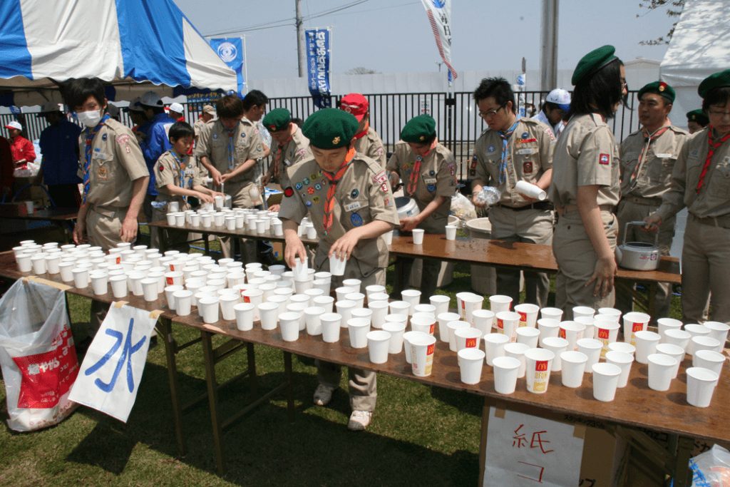 【第19回大会（2009年）】毎年主会場で元気な声でボランティアに当たってくれるボーイスカウトの皆さん。
