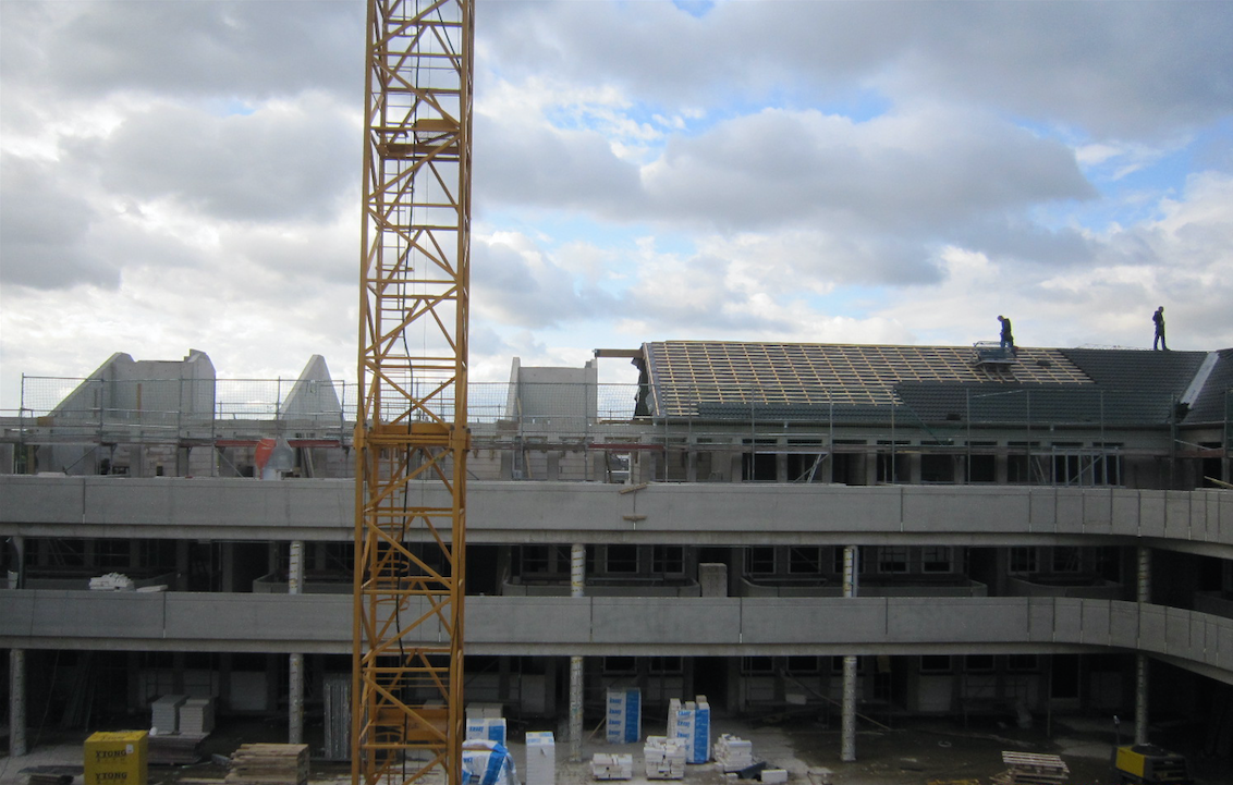 Mehrfamilienhaus mit 76 Wohn- und Büroeinheiten und Tiefgarage als Passivhaus