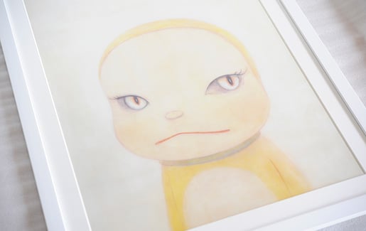 奈良美智のジャイアンにリボンをとられたドラミちゃんを額装しました