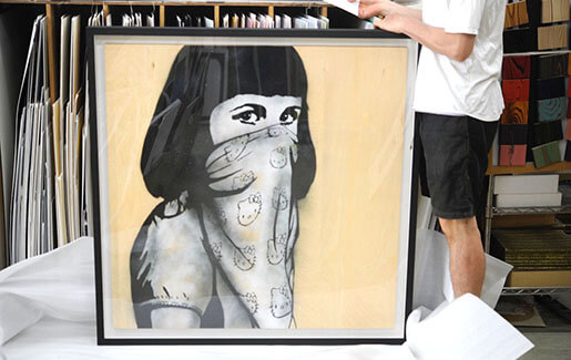 DOLK（ドルク) のKitty Riot（しかもウッドパネル ）を額装しました